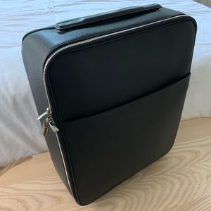 With tags: LOUIS VUITTON Pegasse Leather Carry-On